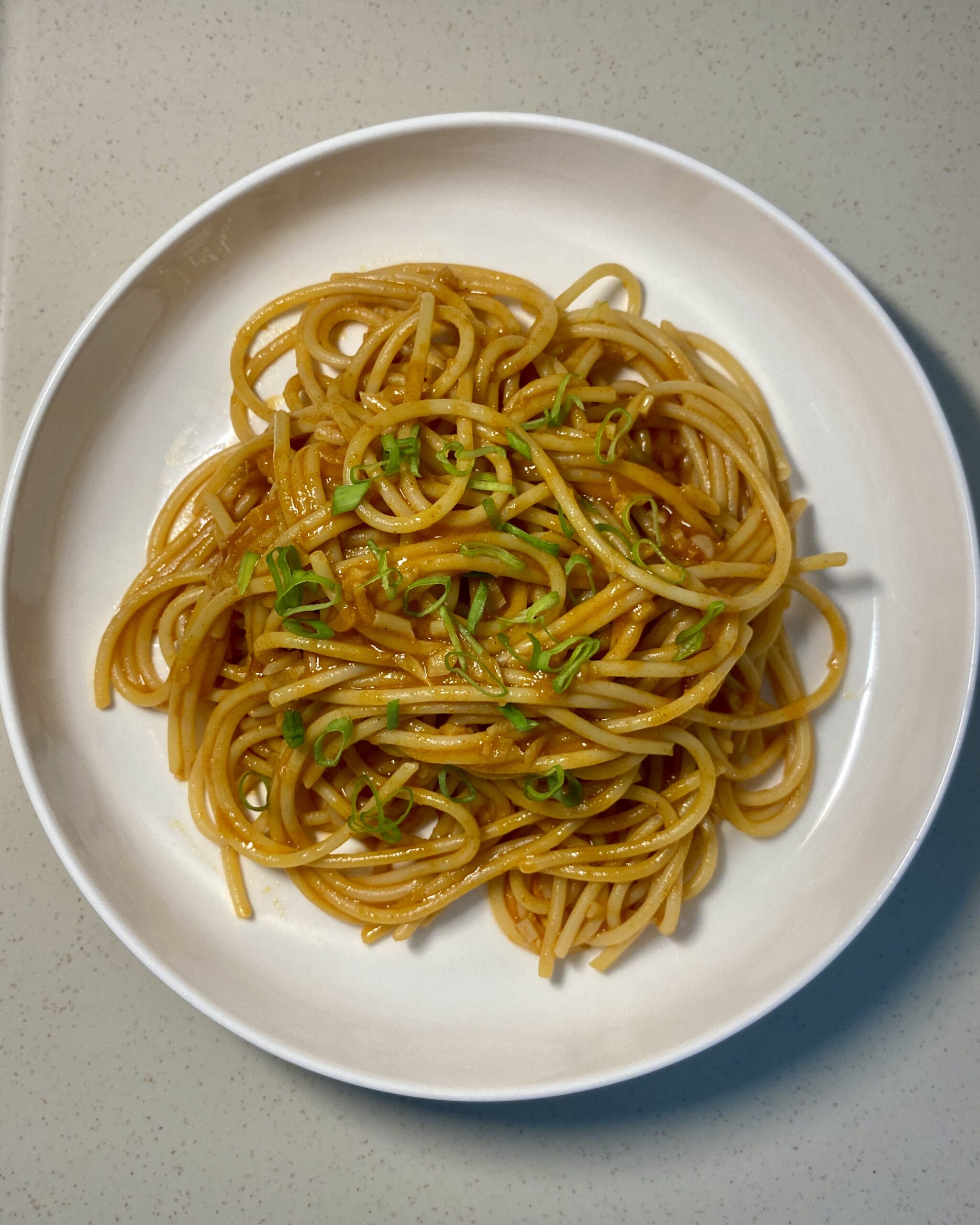 Gochujang garlic butter pasta with a glossy, spicy butter sauce
